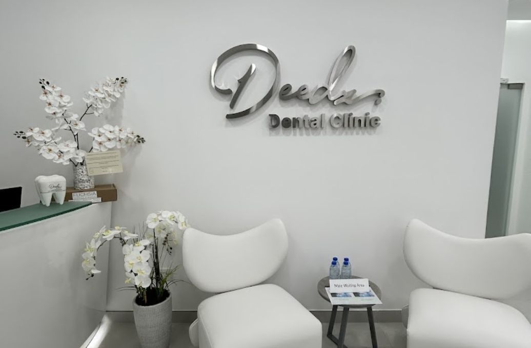 Reception area at Deedz Dental Clinic Dubai, featuring a welcoming atmosphere and comfortable seating